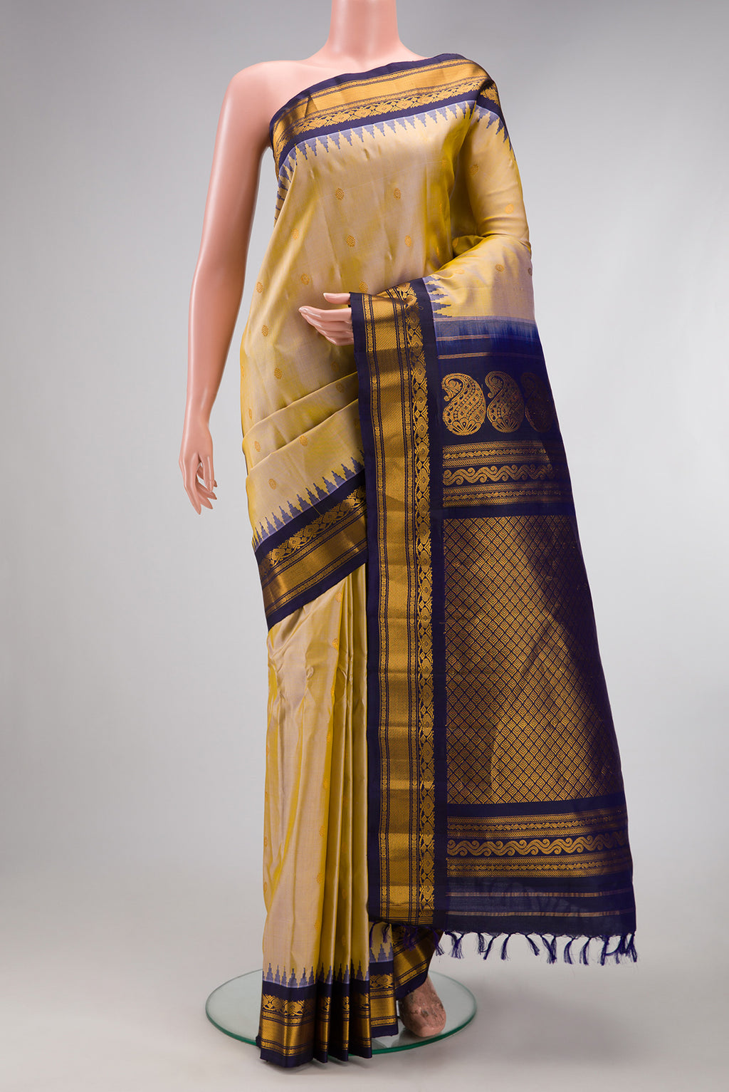 Sandal Dual Tone Gadwal Silk Saree with Checked design on the body and Zari Border.  displayed on a mannequin