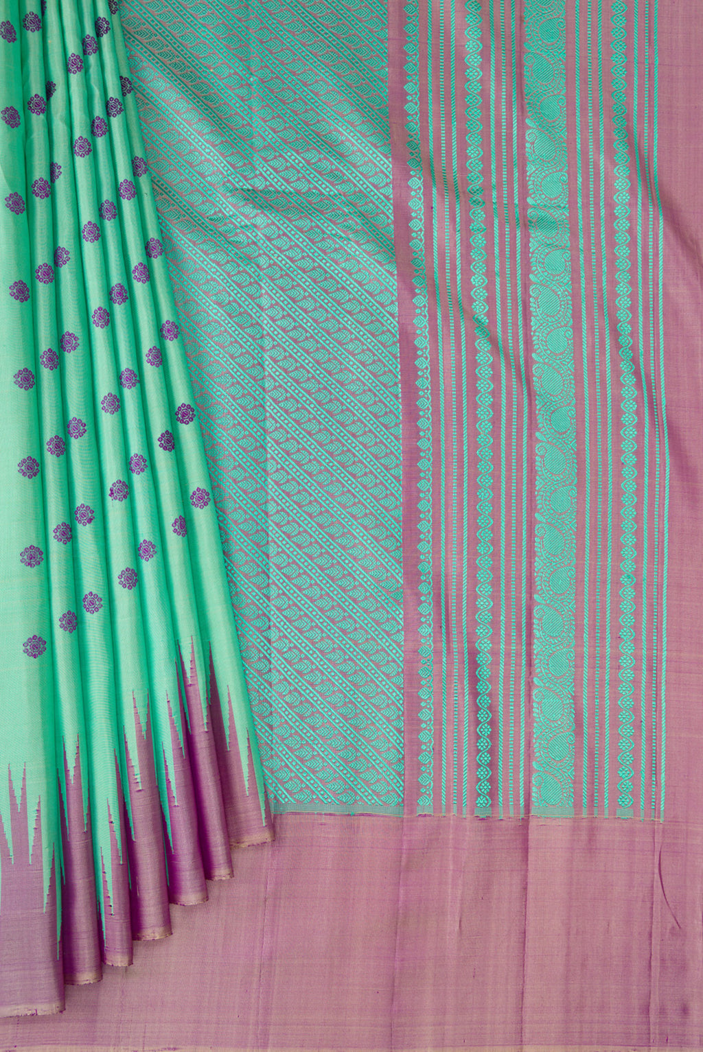 Pleats and pallu of Sea Green Gadwal Silk Saree with Thread Butta on the body and Temple Border. 