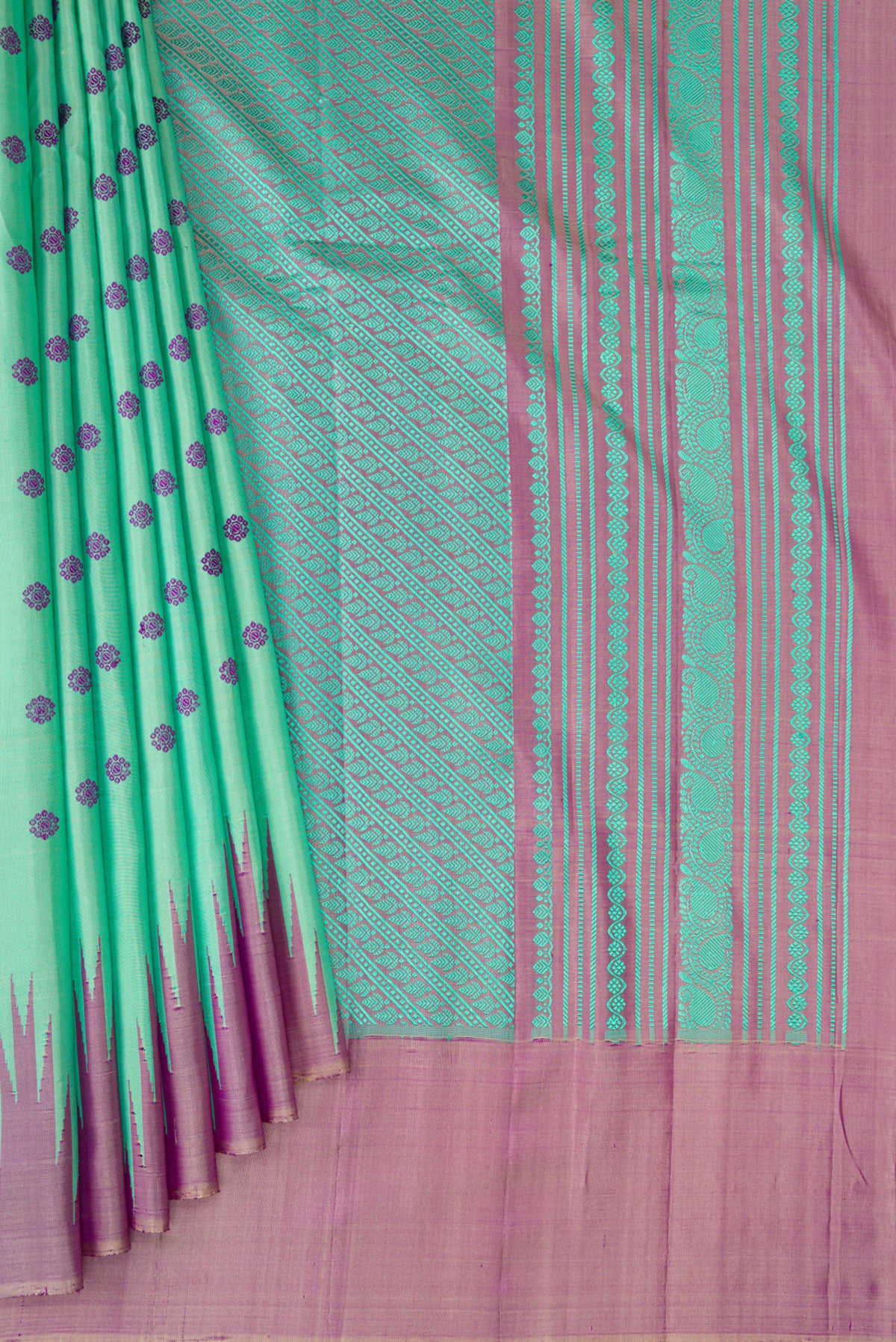 Pleats and pallu of Sea Green Gadwal Silk Saree with Thread Butta on the body and Temple Border. 