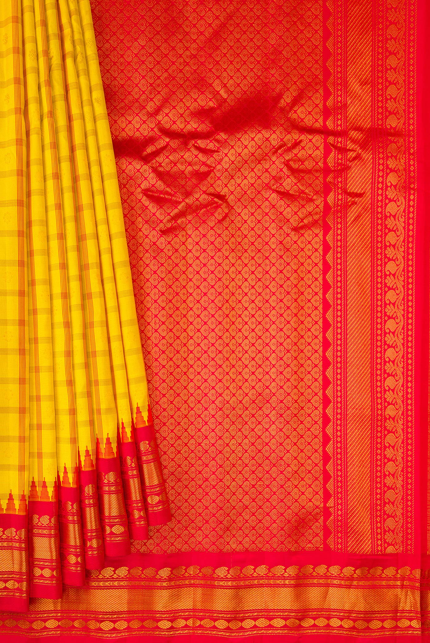 Pleats and pallu of Yellow Gadwal Silk Saree with Checked design on the body and Zari Border. 
