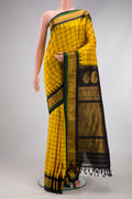 Yellow Gadwal Silk Saree with Checked design on the body and Zari Border.  displayed on a mannequin