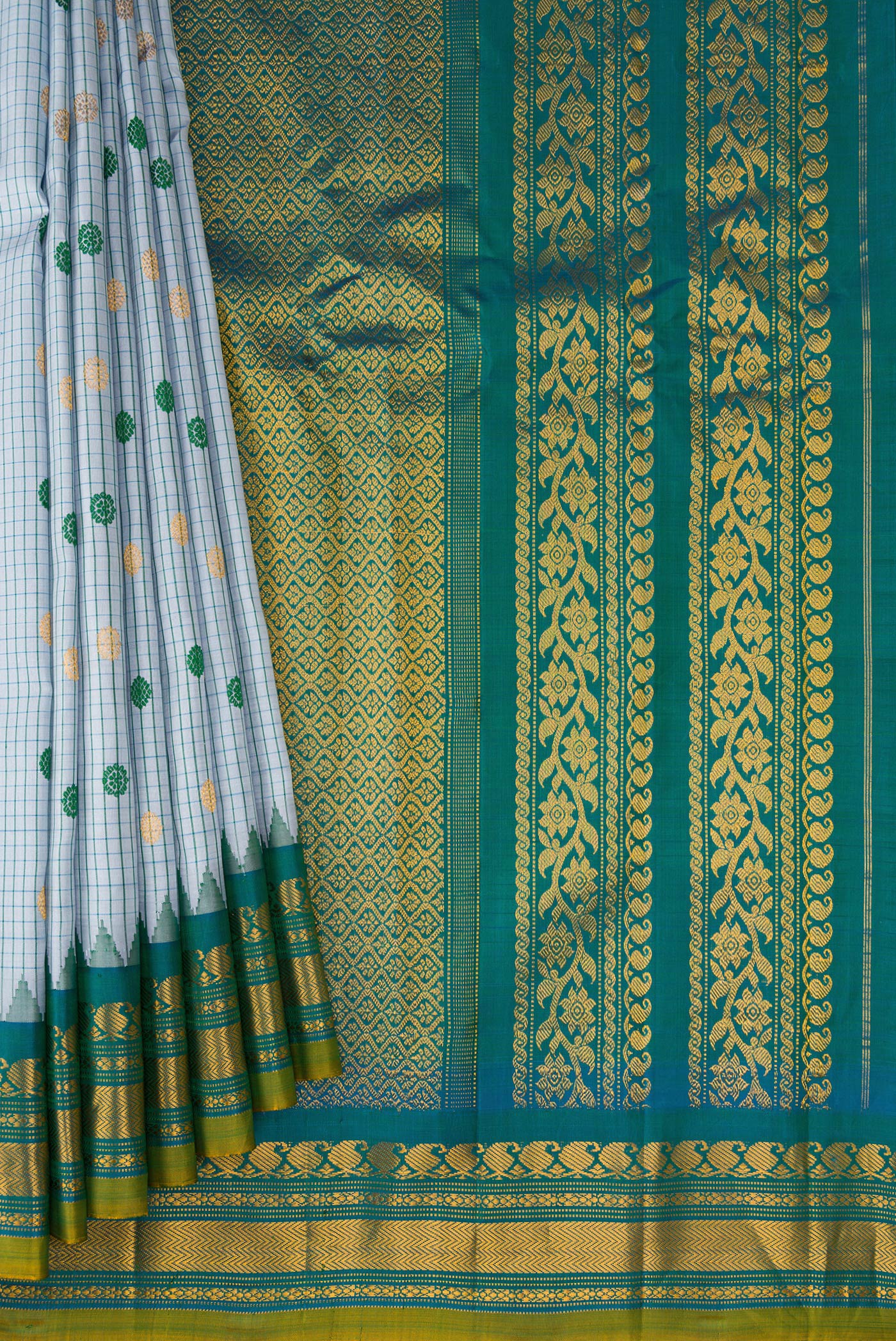Pleats and pallu of Maya Blue Gadwal Silk Saree with Checked design on the body and Temple Border. 