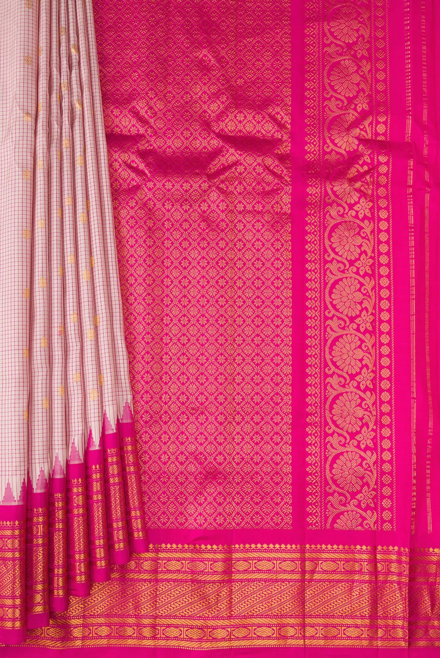 Pleats and pallu of Beige Gadwal Silk Saree with Checked design on the body and Temple Border. 