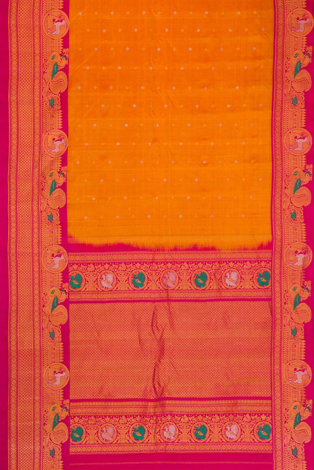 Flat view of Mustard Gadwal Silk Saree with Zari Butta on the body and Fancy Border. 