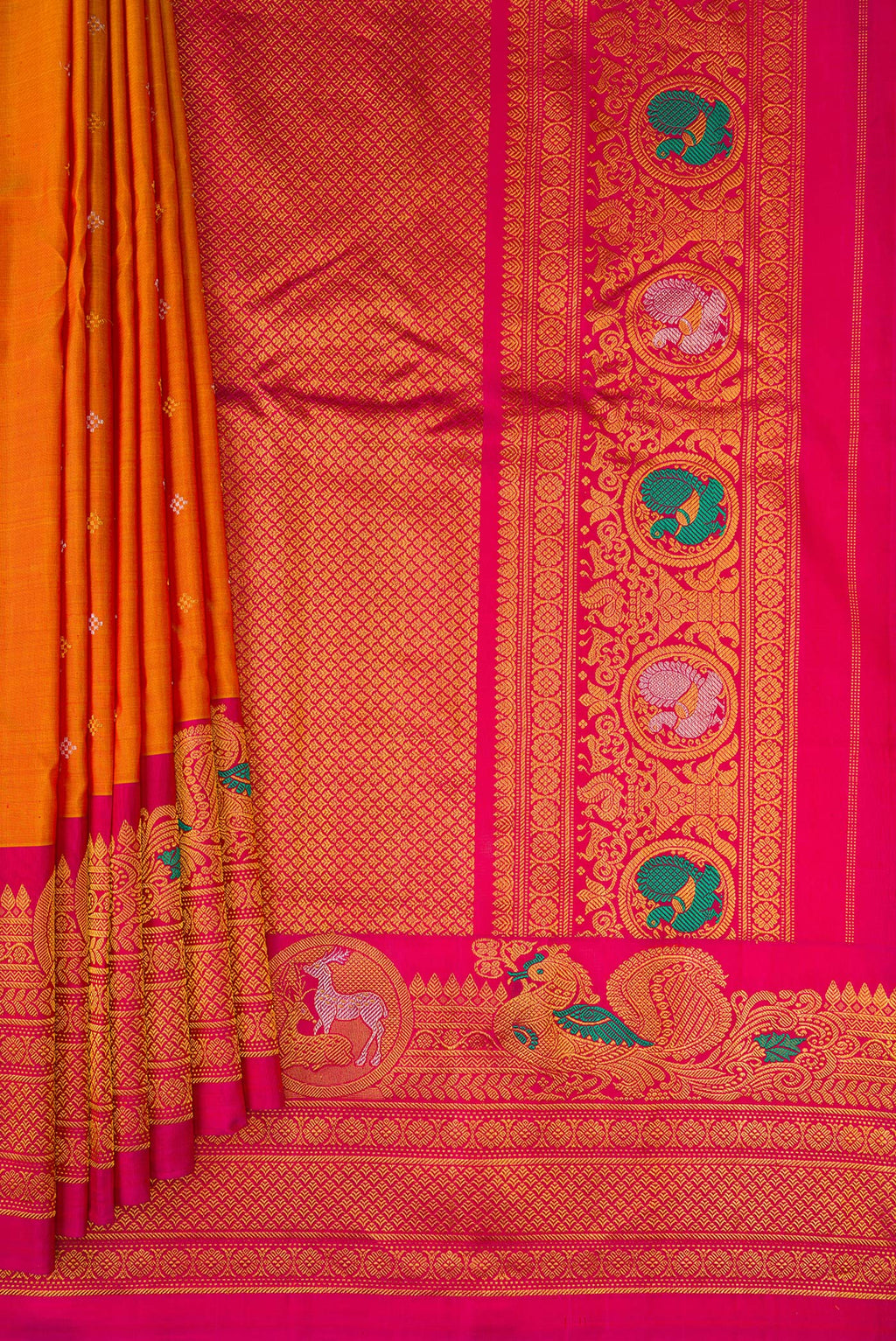 Pleats and pallu of Mustard Gadwal Silk Saree with Zari Butta on the body and Fancy Border. 