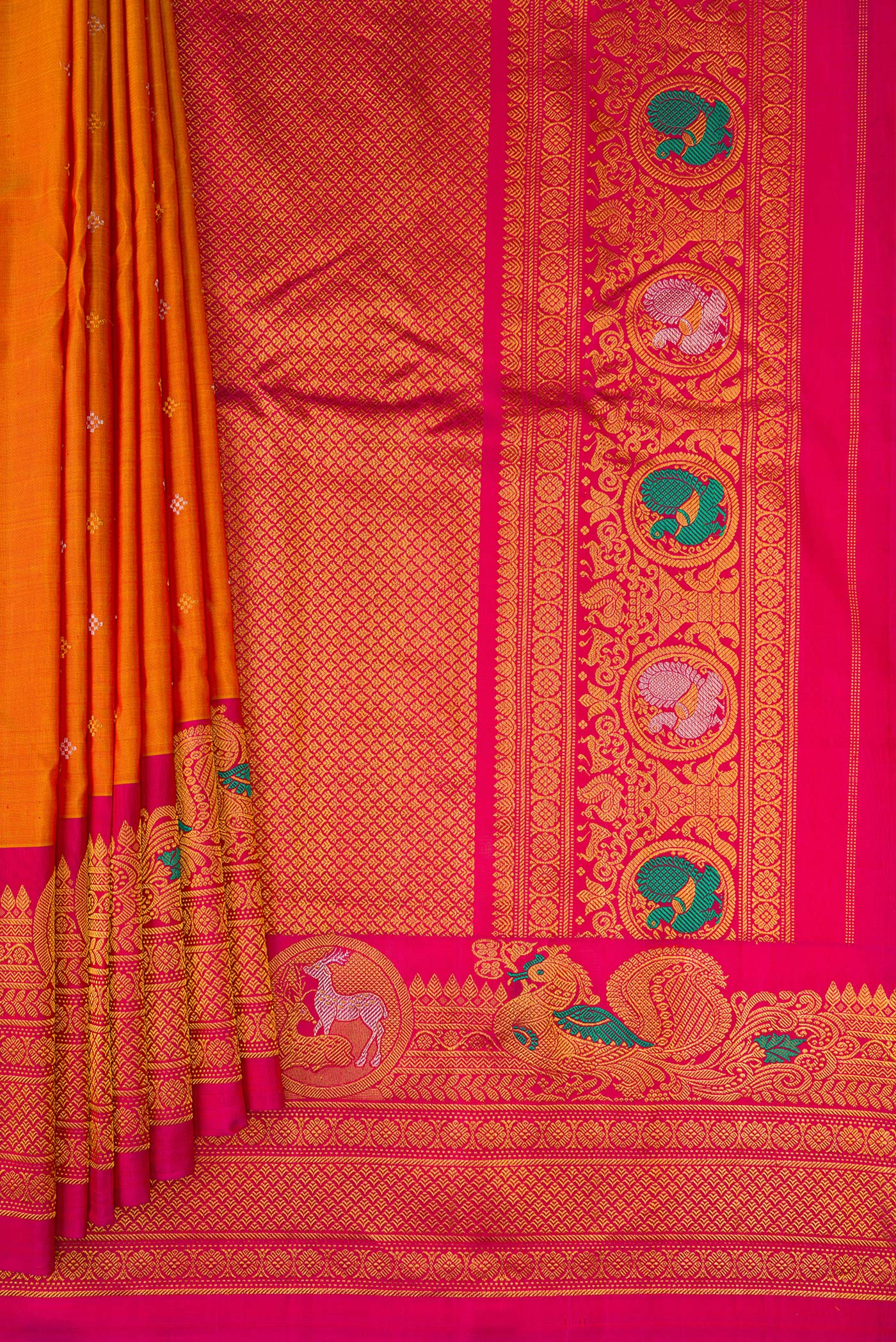 Pleats and pallu of Mustard Gadwal Silk Saree with Zari Butta on the body and Fancy Border. 