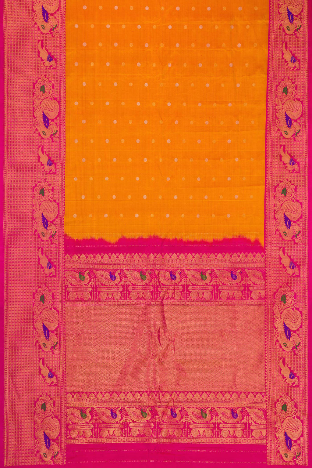 Flat view of Mustard Dual Tone Gadwal Silk Saree with Zari Butta on the body and Fancy Border. 