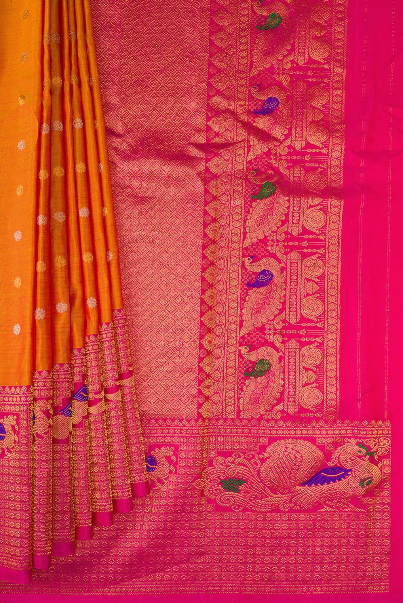 Pleats and pallu of Mustard Dual Tone Gadwal Silk Saree with Zari Butta on the body and Fancy Border. 