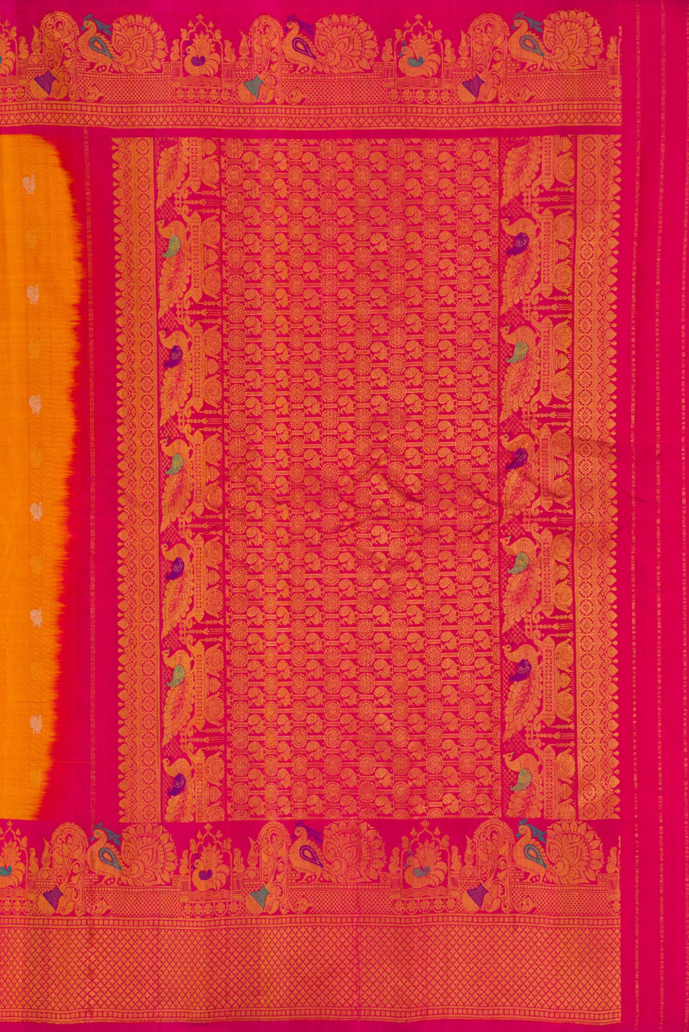 Close up image of the pallu of Mustard Gadwal Silk Saree with Zari Butta on the body and Fancy Border. 