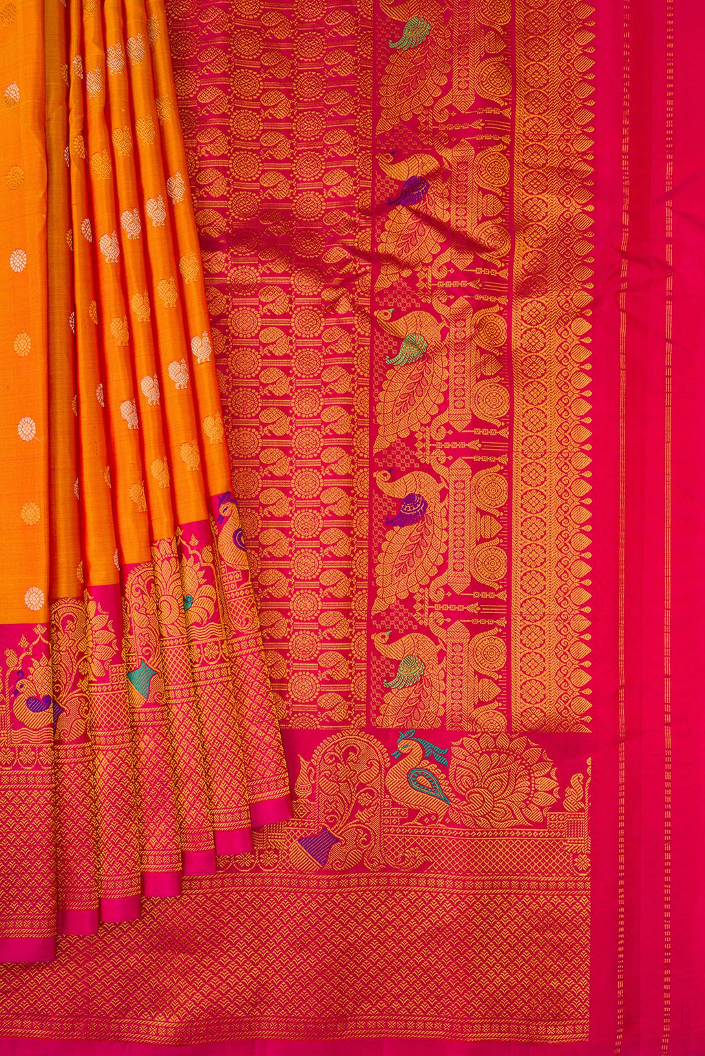 Pleats and pallu of Mustard Gadwal Silk Saree with Zari Butta on the body and Fancy Border. 