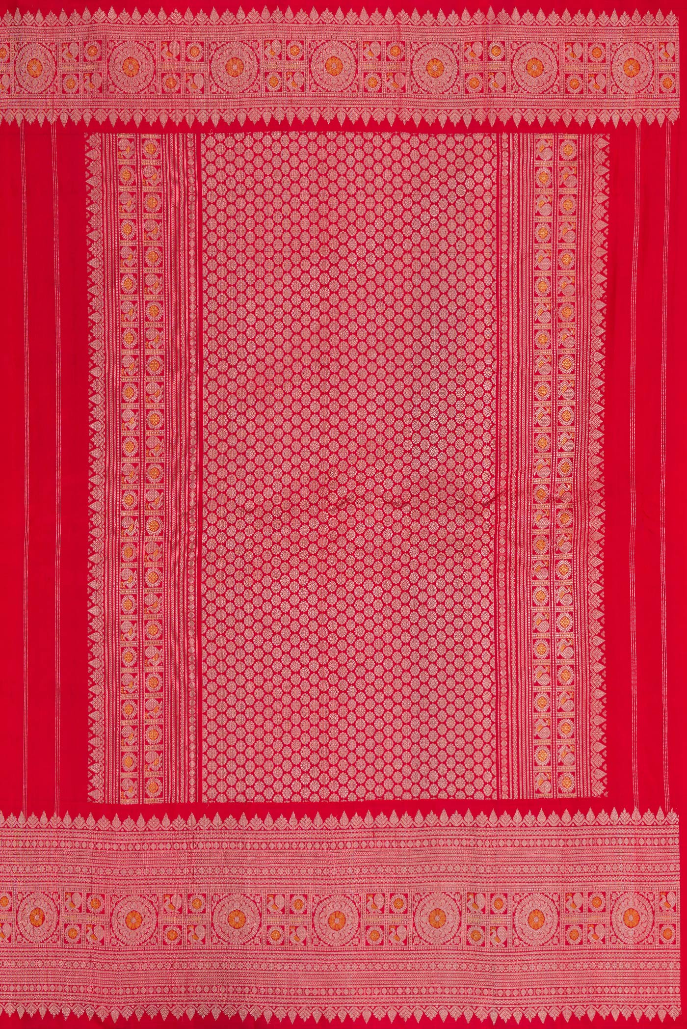 Close up image of the pallu of Red Gadwal Silk Saree with Zari Butta on the body and Zari Border. 