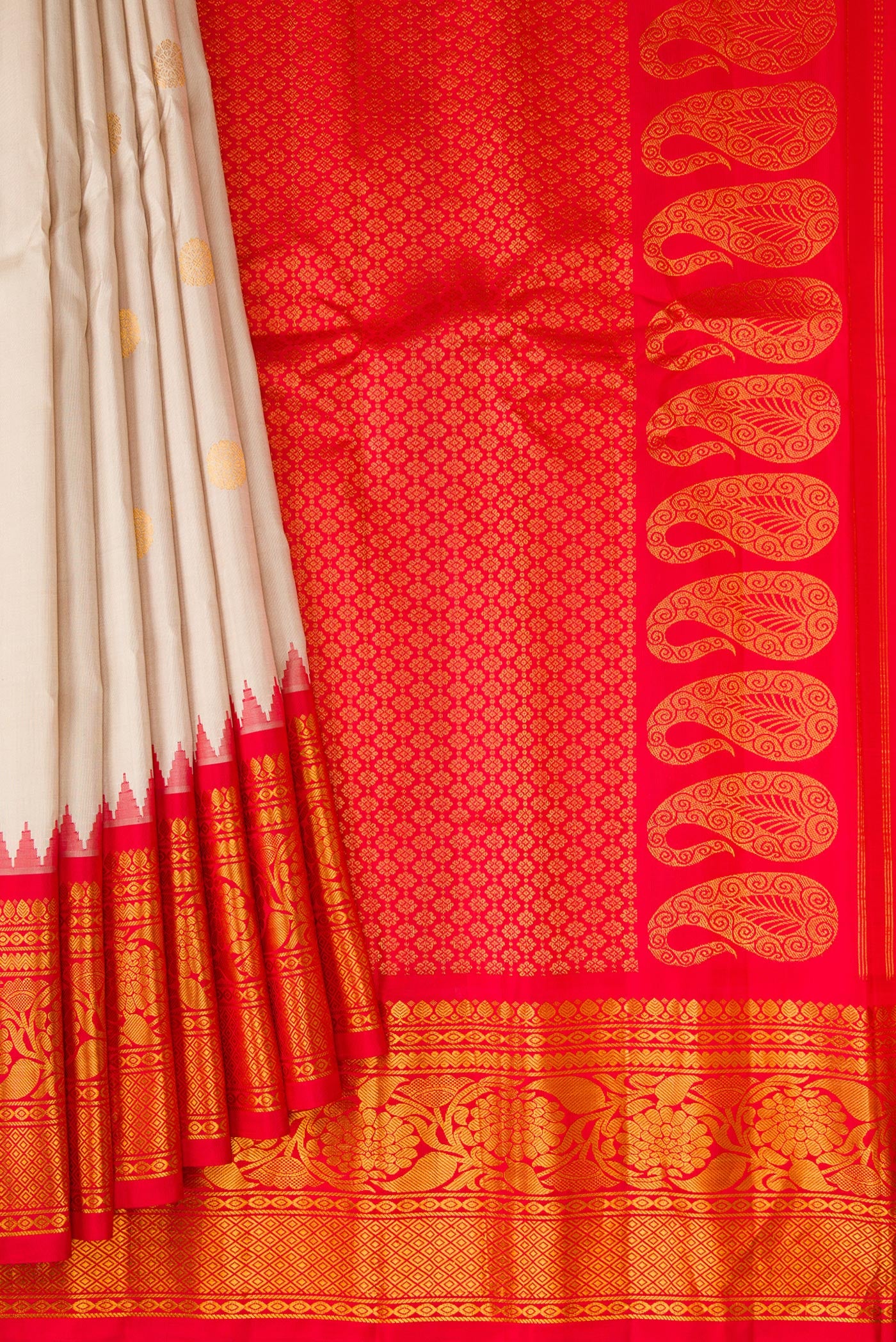 Pleats and pallu of Beige Gadwal Silk Saree with Zari Butta on the body and Fancy Border. 