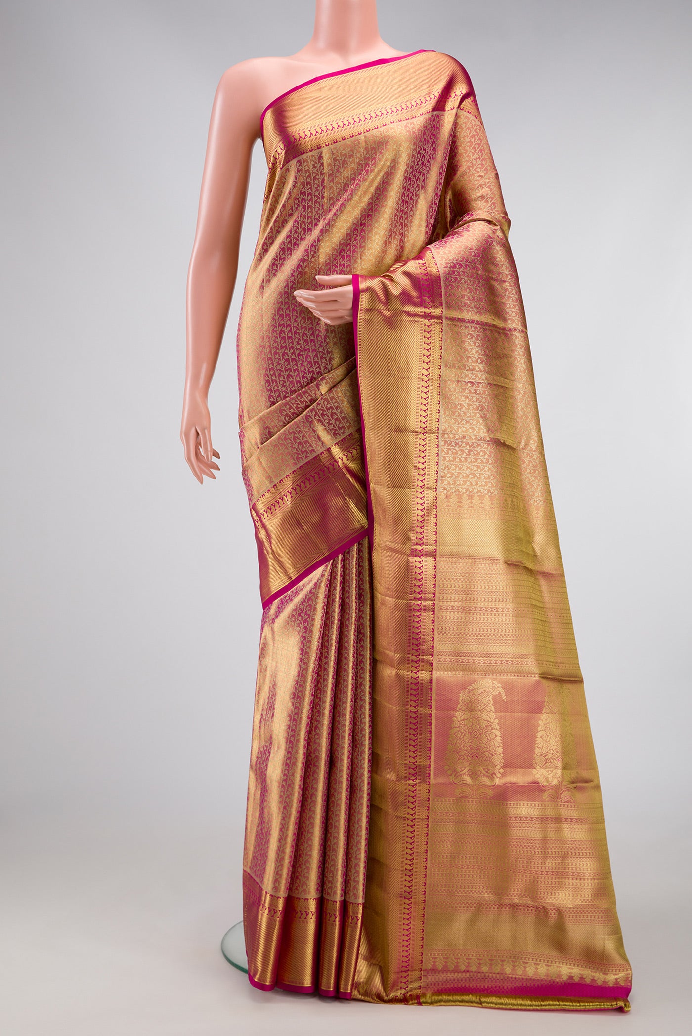 Pink Dual Tone Kanchipuram Tissue Silk Saree with Zari Brocade on the body and Zari Border.  displayed on a mannequin