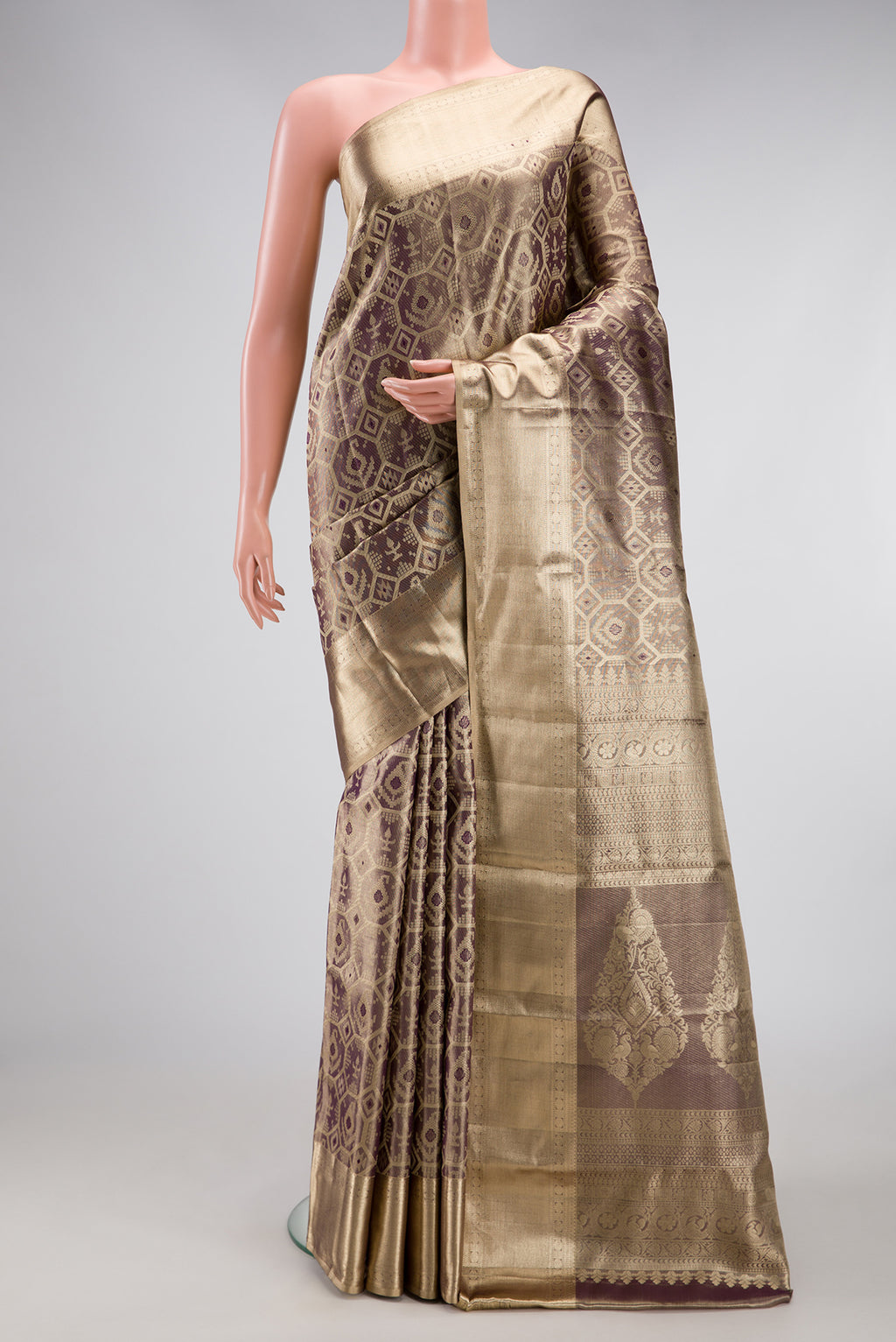 Purple Dual Tone Kanjivaram Tissue Silk Saree with Zari Brocade on the body and Zari Border.  displayed on a mannequin