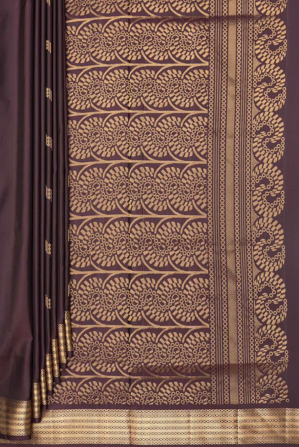 Pleats and pallu of Pure Silk Coffee Brown Soft Saree with Zari Butta on the body and Zari Border. 