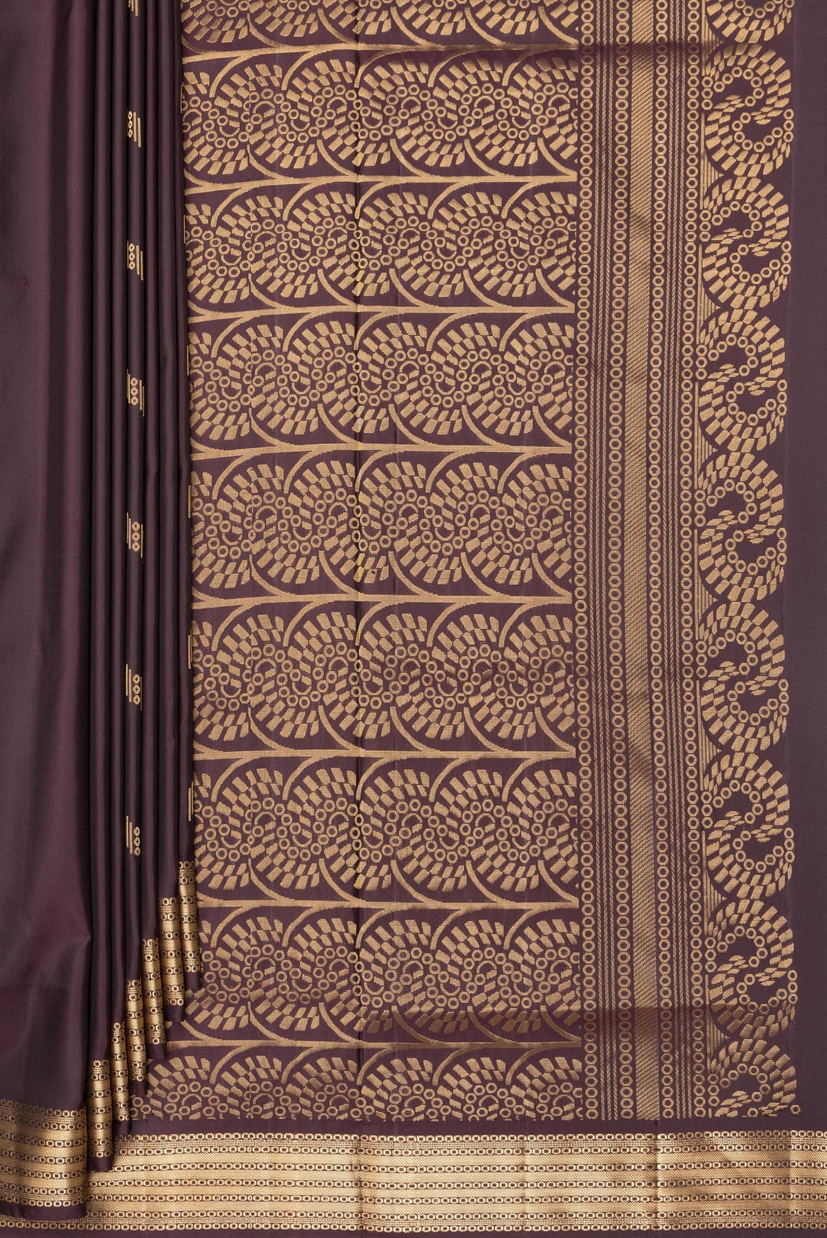 Pleats and pallu of Pure Silk Coffee Brown Soft Saree with Zari Butta on the body and Zari Border. 