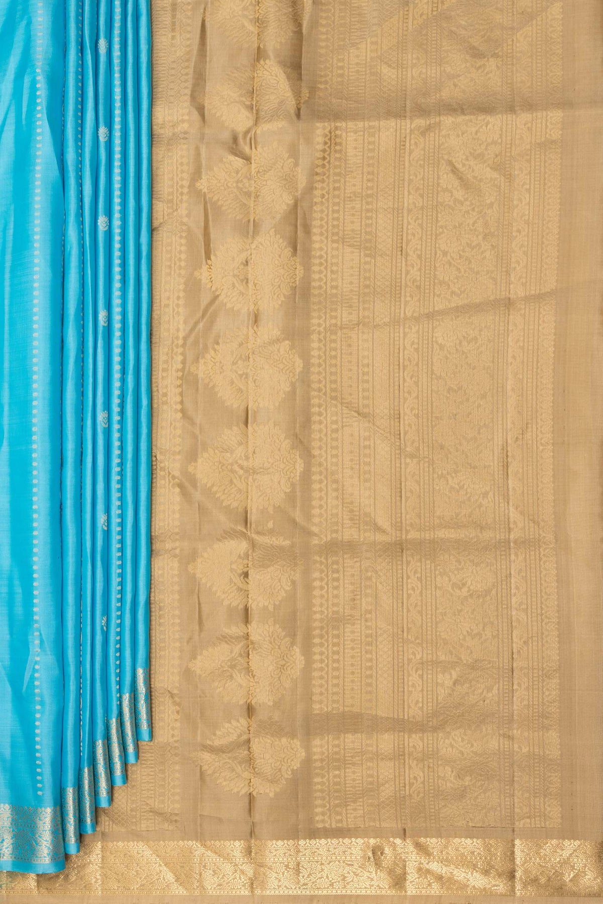 Pleats and pallu of Pure Silk Sky Blue Dual Tone Soft Saree with Zari Butta on the body and Zari Border. 