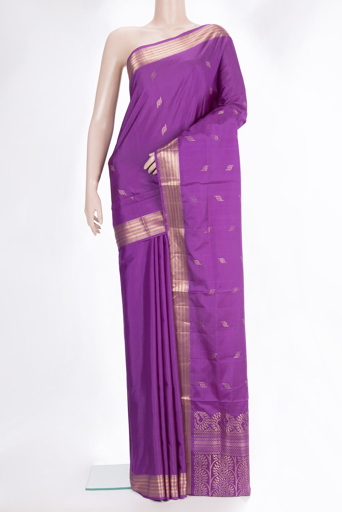 Pure Silk Purple Soft Saree with Zari Butta on the body and Zari Border.  displayed on a mannequin