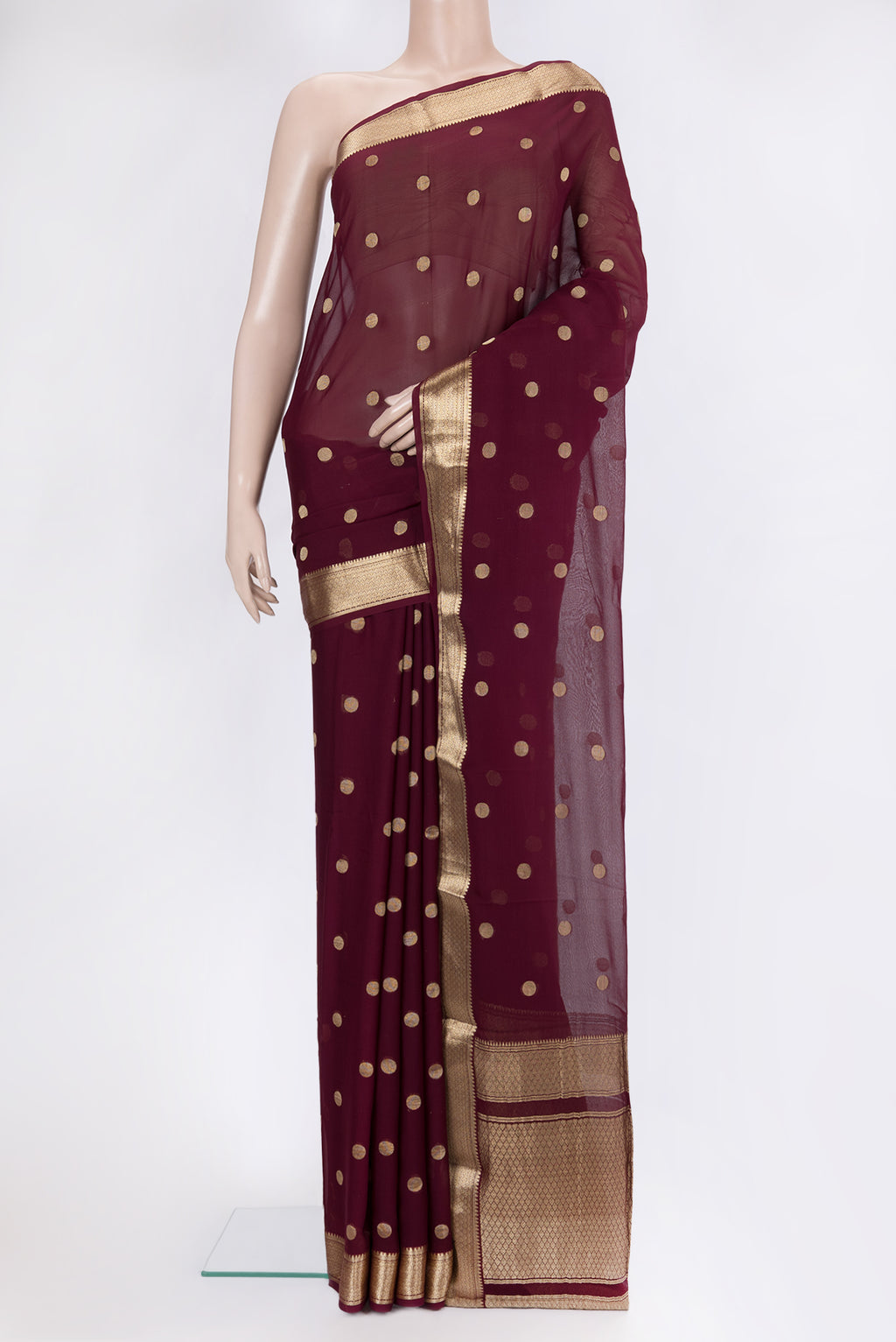 Maroon Dual Tone Georgette Saree with Zari Butta on the body and Zari Border.  displayed on a mannequin
