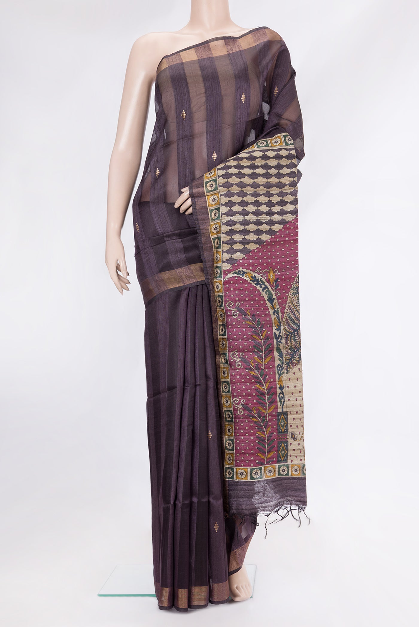 Burgundy Tussar Silk Saree with Stripes on the body and Zari Border.  displayed on a mannequin