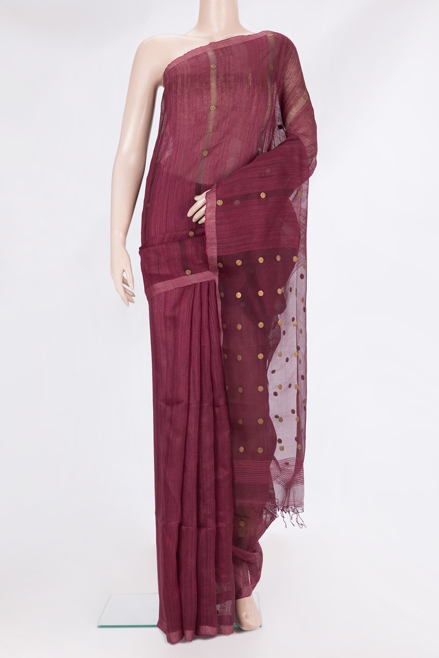 Pure Silk Maroon Tussar Saree with Embroidery on the body and Without Border.  displayed on a mannequin