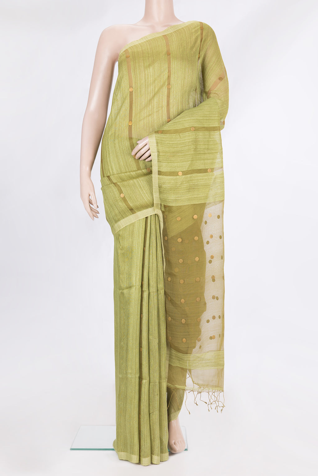 Mehandi Green Tussar Saree with Embroidery on the body and Without Border.  displayed on a mannequin