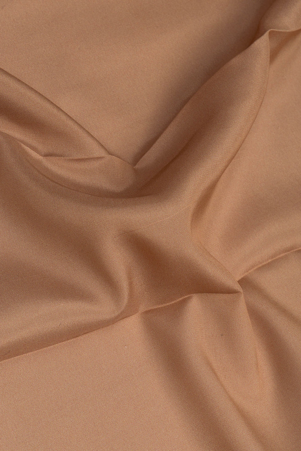Close up of Dark Beige Mysore Silk Saree with Plain Body and Fancy Border.  displaying folds