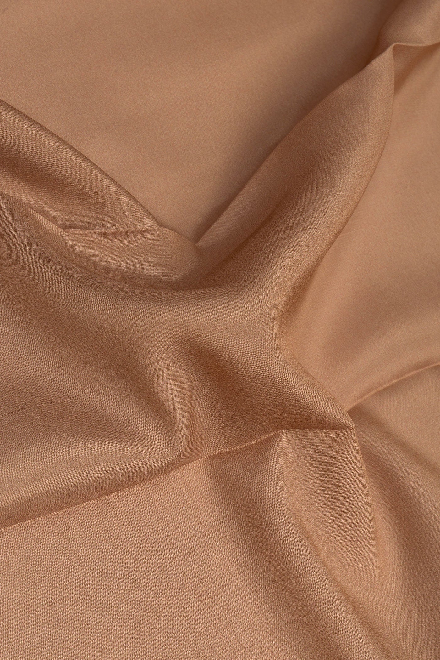 Close up of Dark Beige Mysore Silk Saree with Plain Body and Fancy Border.  displaying folds