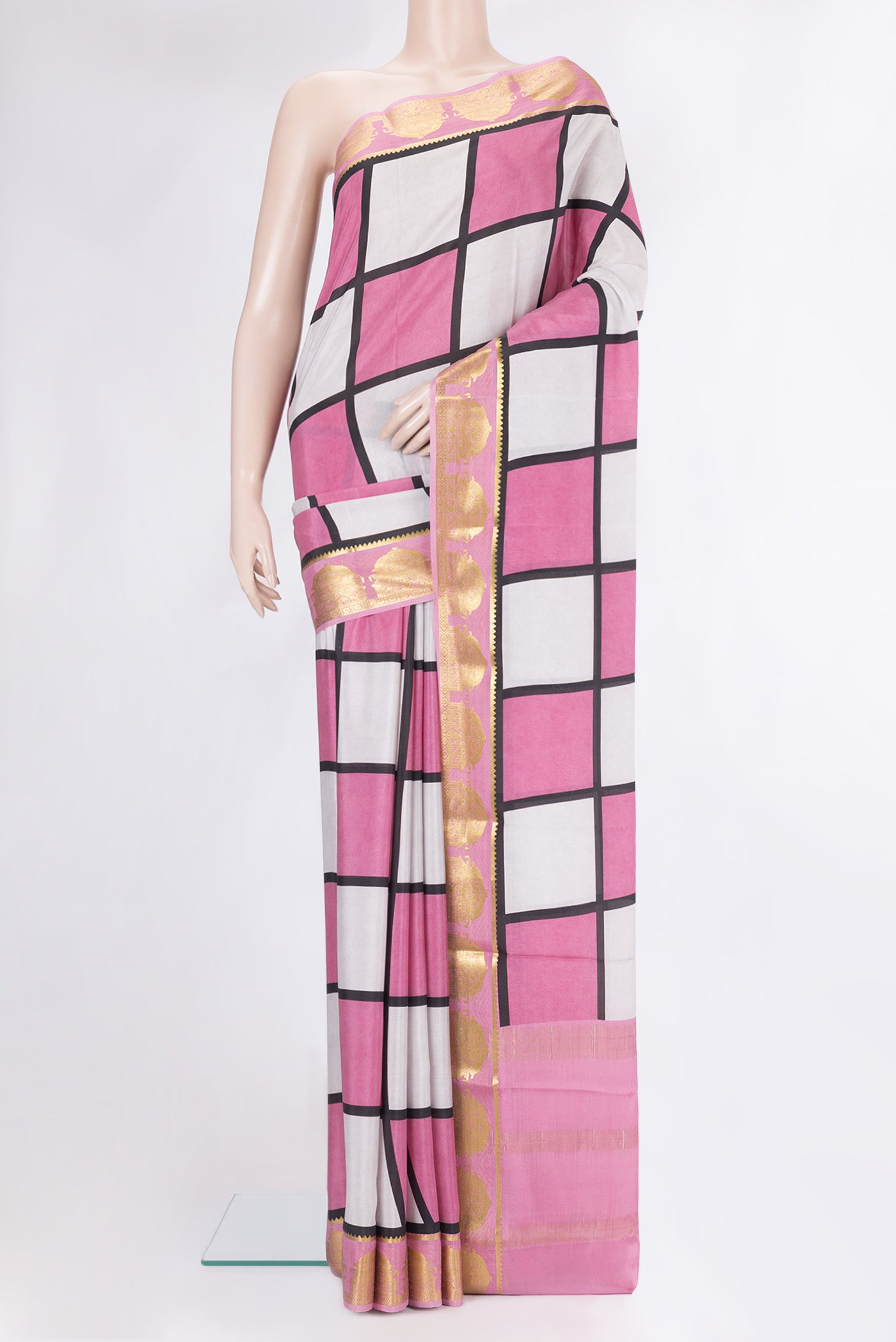 Multi Color Mysore Silk Saree with Printed design on the body and Zari Border.  displayed on a mannequin