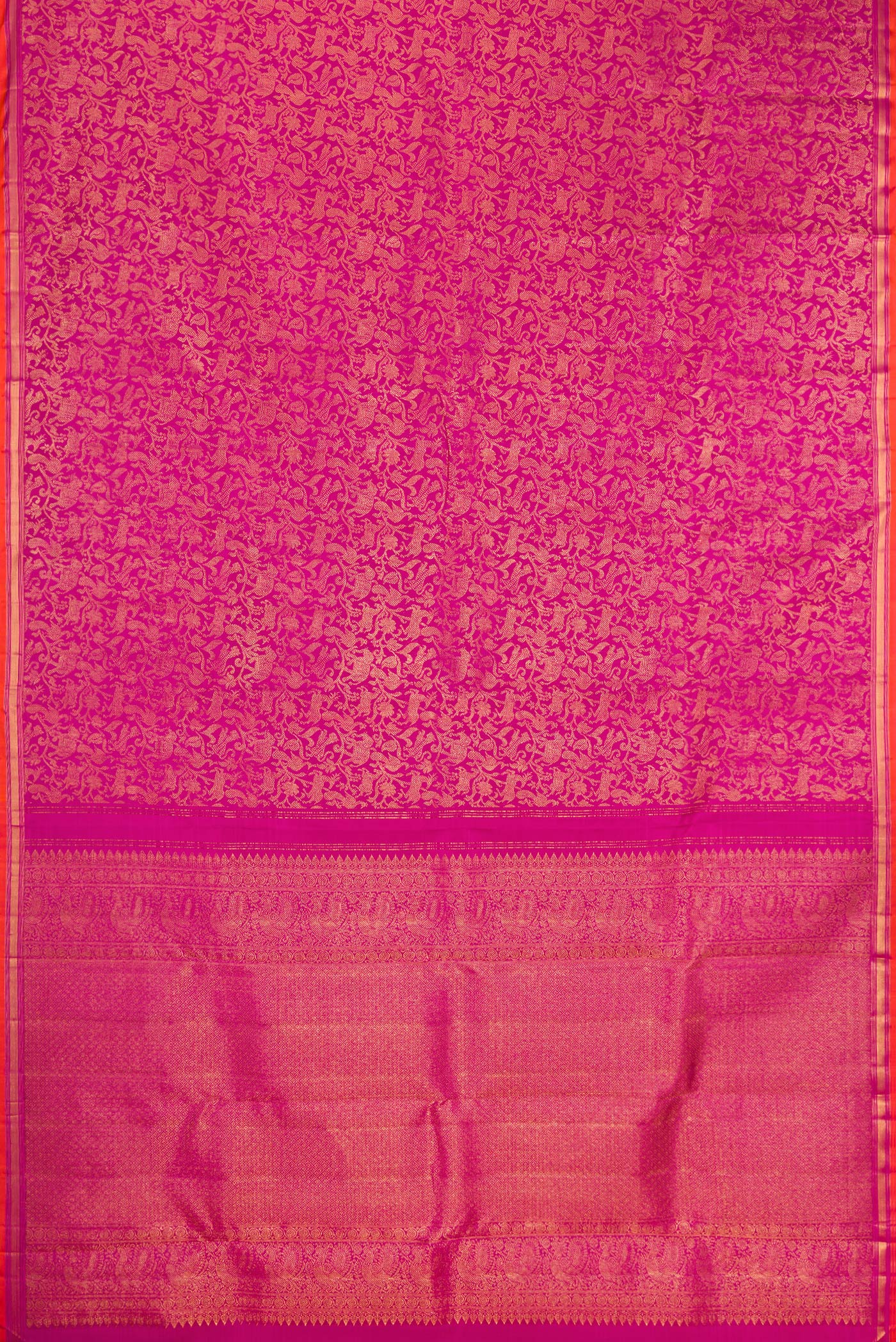 Flat view of Magenta Kanjivaram Silk Saree with Zari Brocade on the body and Zari Border. 
