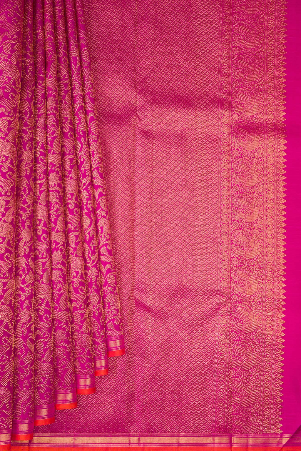 Pleats and pallu of Magenta Kanjivaram Silk Saree with Zari Brocade on the body and Zari Border. 