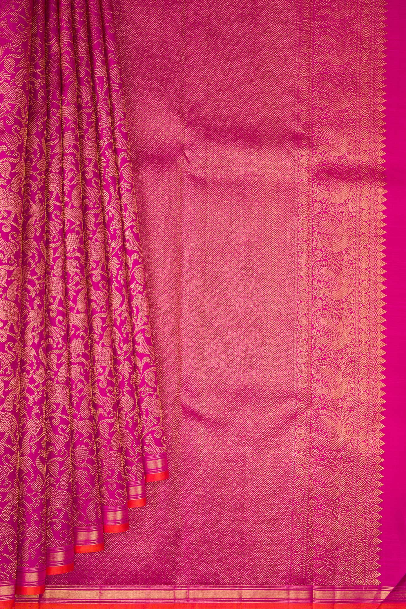 Pleats and pallu of Magenta Kanjivaram Silk Saree with Zari Brocade on the body and Zari Border. 