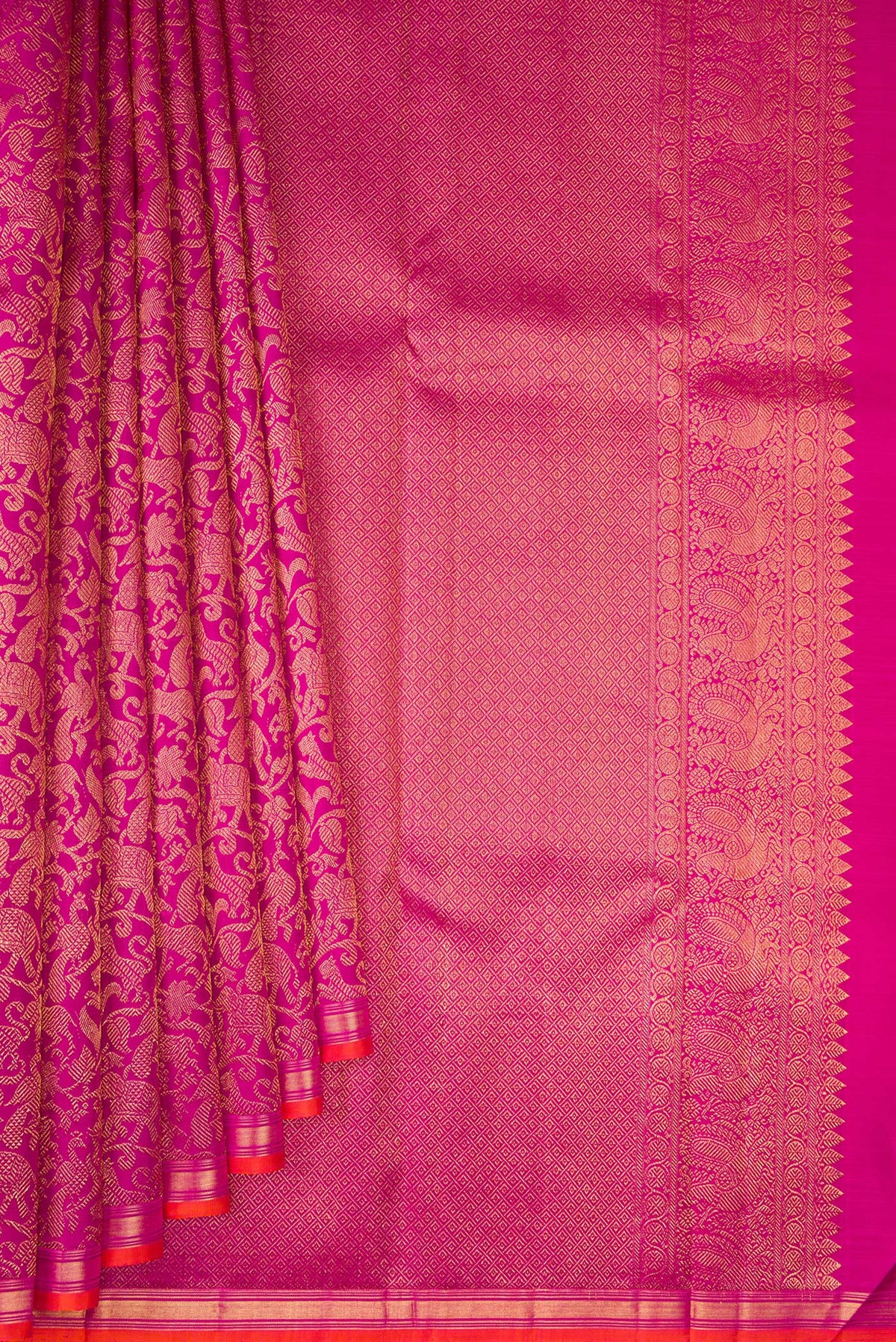 Pleats and pallu of Magenta Kanjivaram Silk Saree with Zari Brocade on the body and Zari Border. 