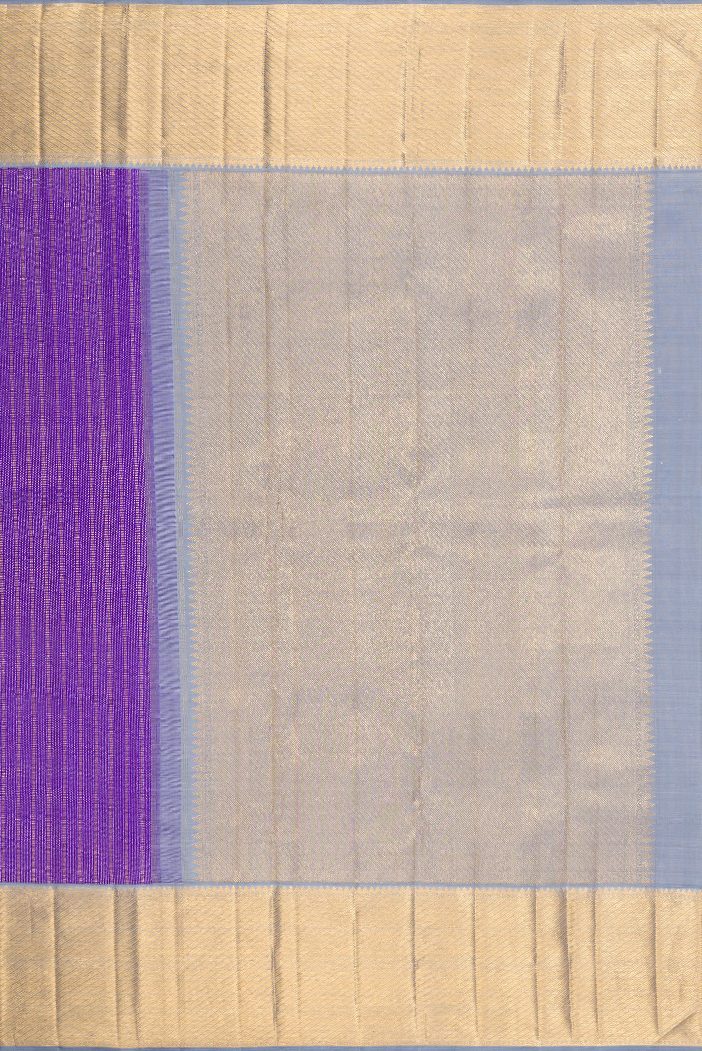 Close up image of the pallu of Violet Kanchipuram Silk Saree with Zari Brocade on the body and Zari Border. 