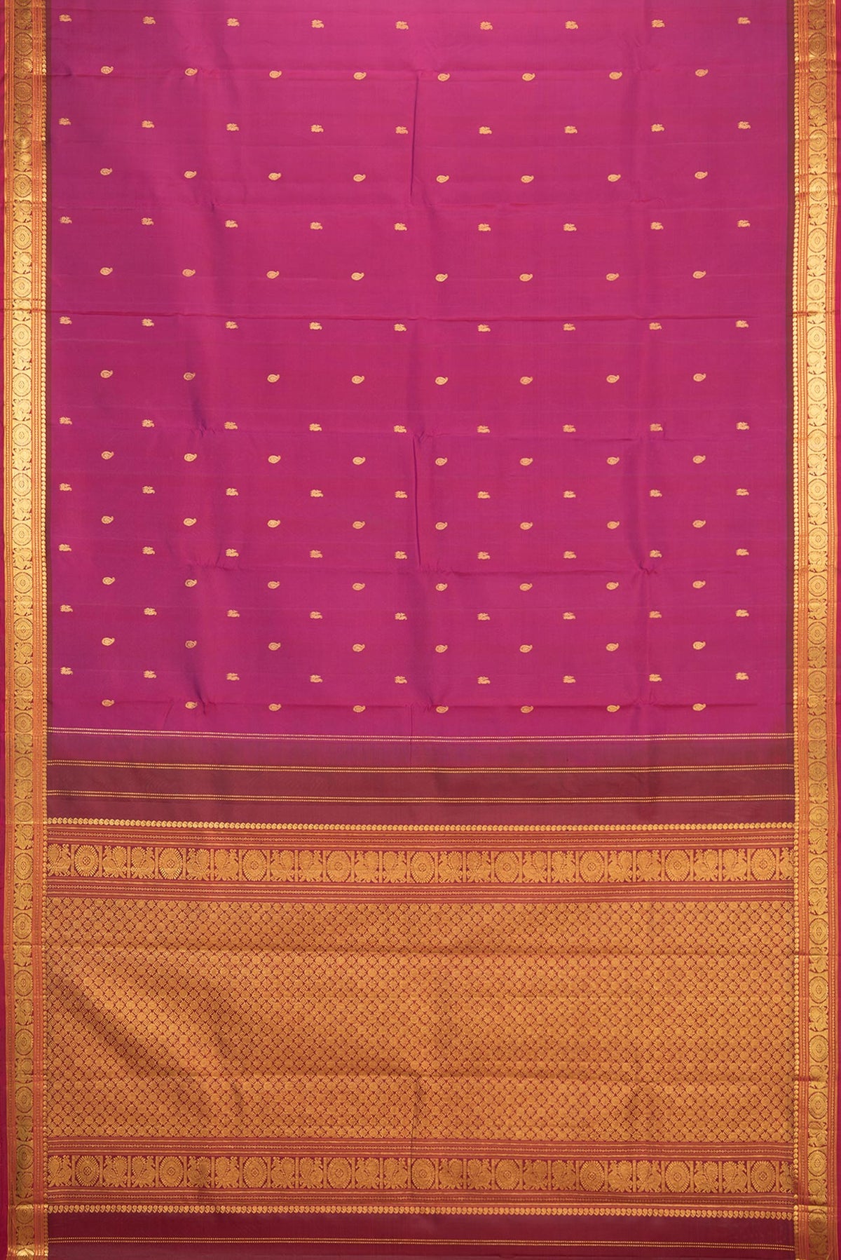 Flat view of Pure Silk Magenta Kanchipuram Saree with Zari Butta on the body and Zari Border. 