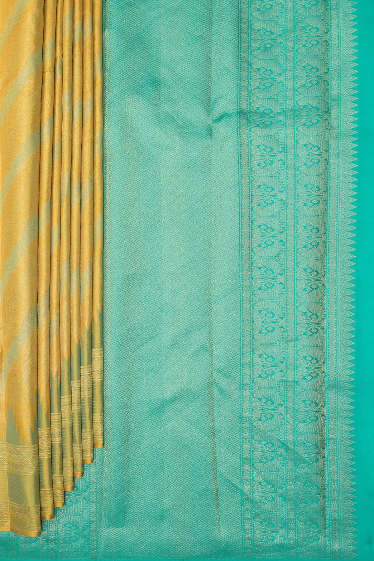 Pleats and pallu of Pure Silk Mustard Dual Tone Kanjivaram Saree with Zari Brocade on the body and Temple Border. 