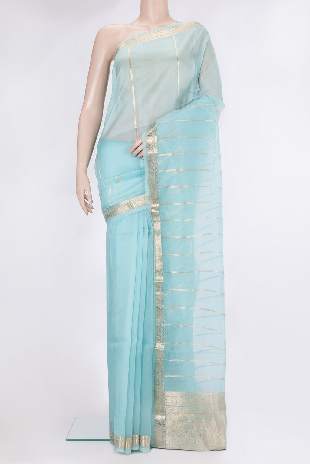 Light Blue Organza Silk Saree with Stripes on the body and Zari Border.  displayed on a mannequin