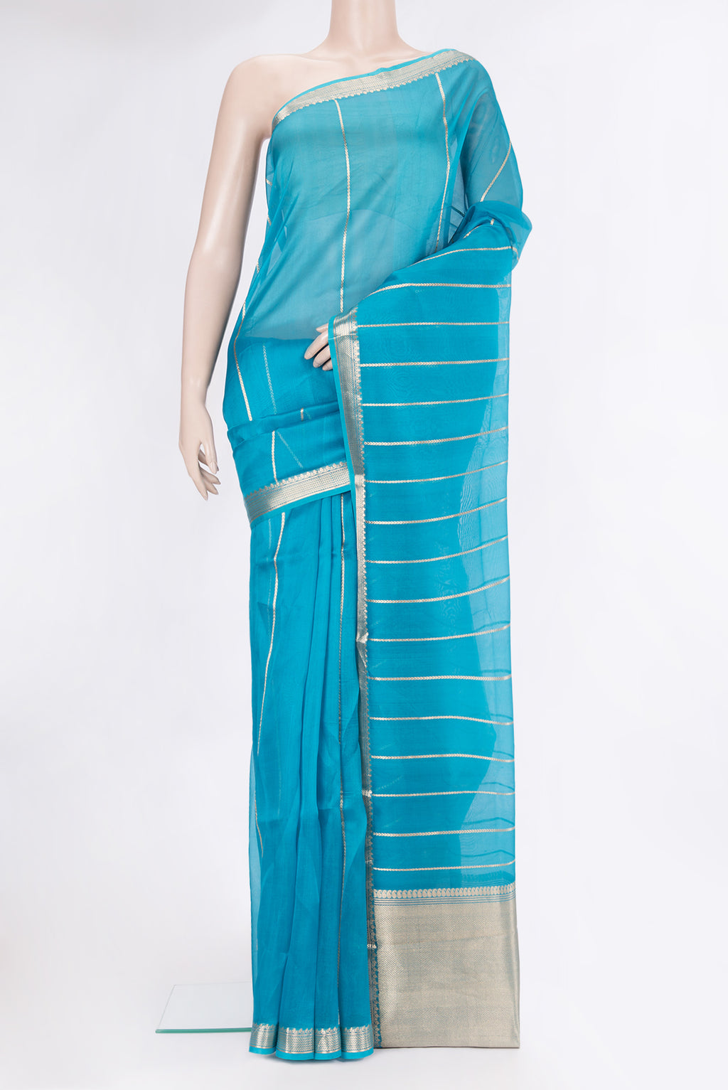 Sky Blue Organza Silk Saree with Stripes on the body and Zari Border.  displayed on a mannequin