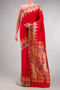 Red Dual Tone Paithani Silk Saree with Zari Butta on the body and Paithani Border.  displayed on a mannequin