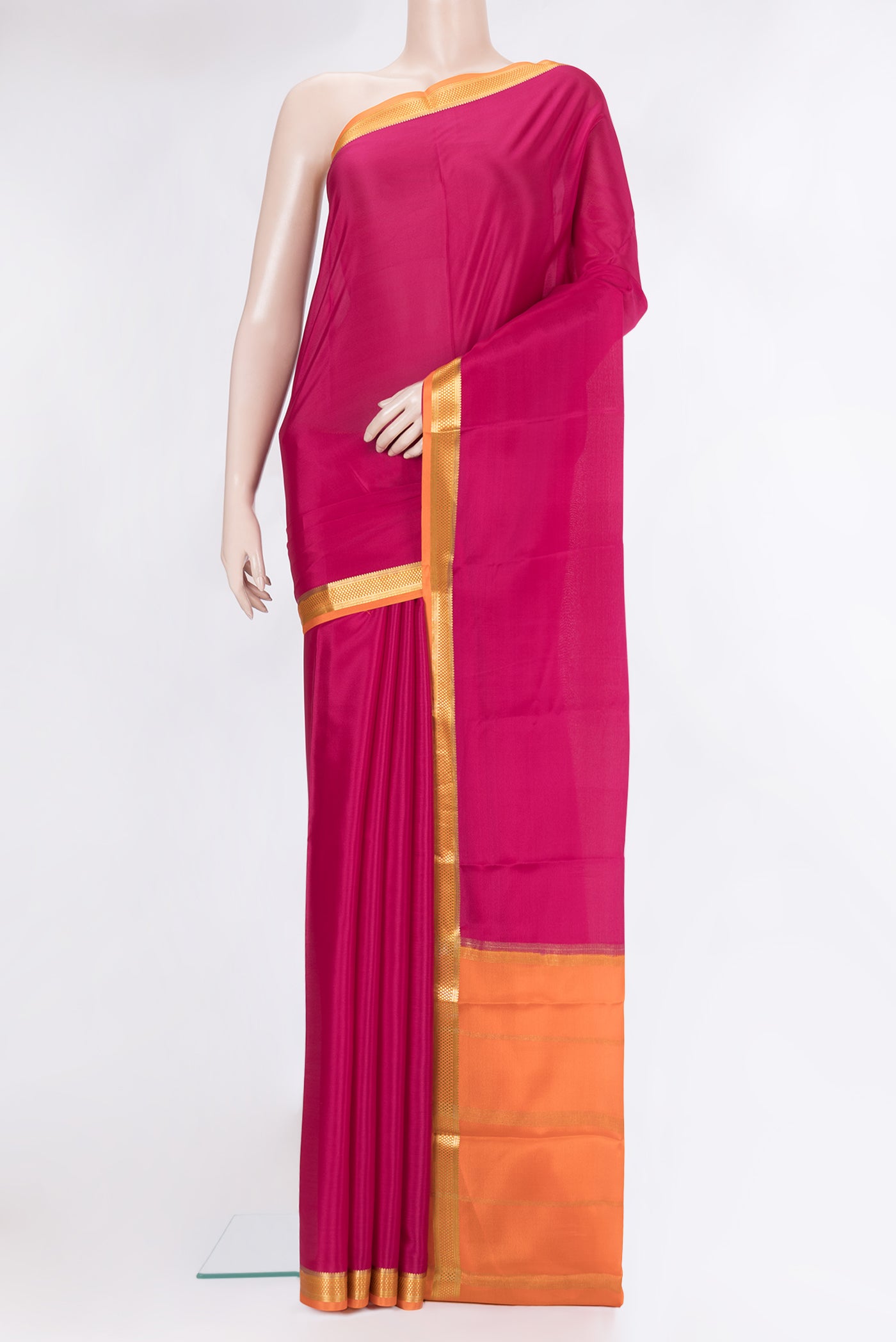Dark Pink Mysore Silk Saree with Plain Body and Zari Border.  displayed on a mannequin