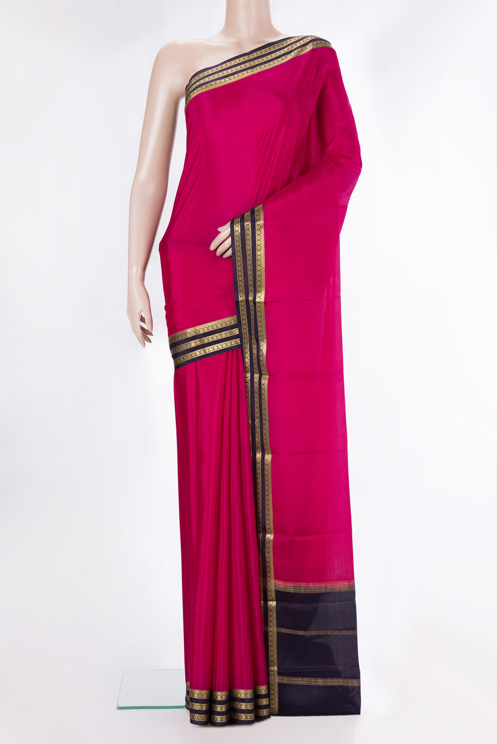 Dark Pink Mysore Crepe Saree with Plain Body and Zari Border.  displayed on a mannequin
