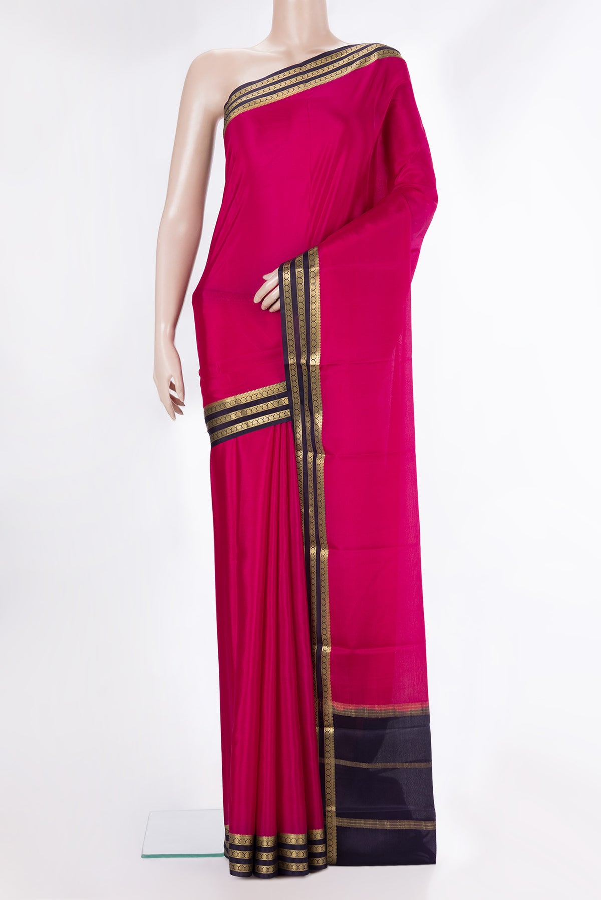 Dark Pink Mysore Crepe Saree with Plain Body and Zari Border.  displayed on a mannequin