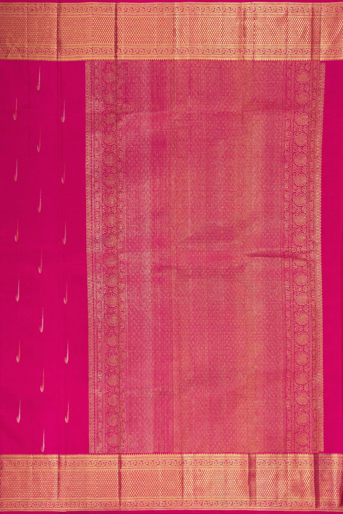 Close up image of the pallu of Pure Silk Rani Pink Kanchipuram Saree with Zari Butta on the body and Zari Border. 