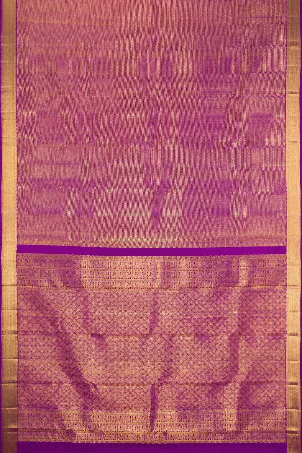 Flat view of Purple Kanchipuram Silk Saree with Zari Brocade on the body and Zari Border. 