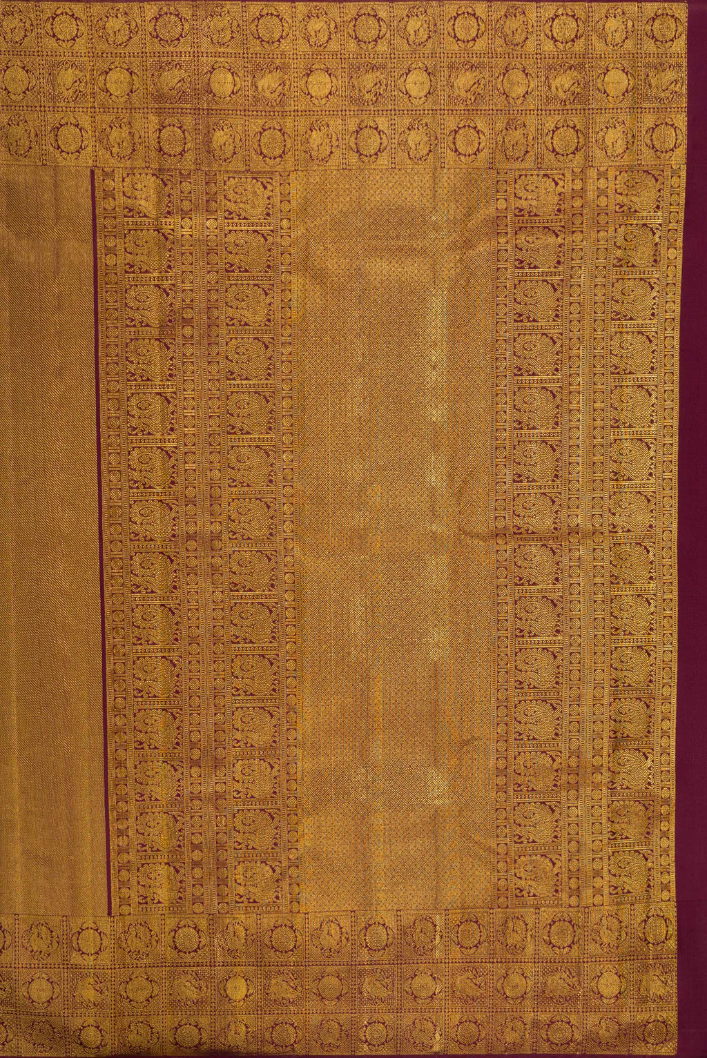 Close up image of the pallu of Coffee Brown Kanchipuram Silk Saree with Zari Brocade on the body and Fancy Border. 