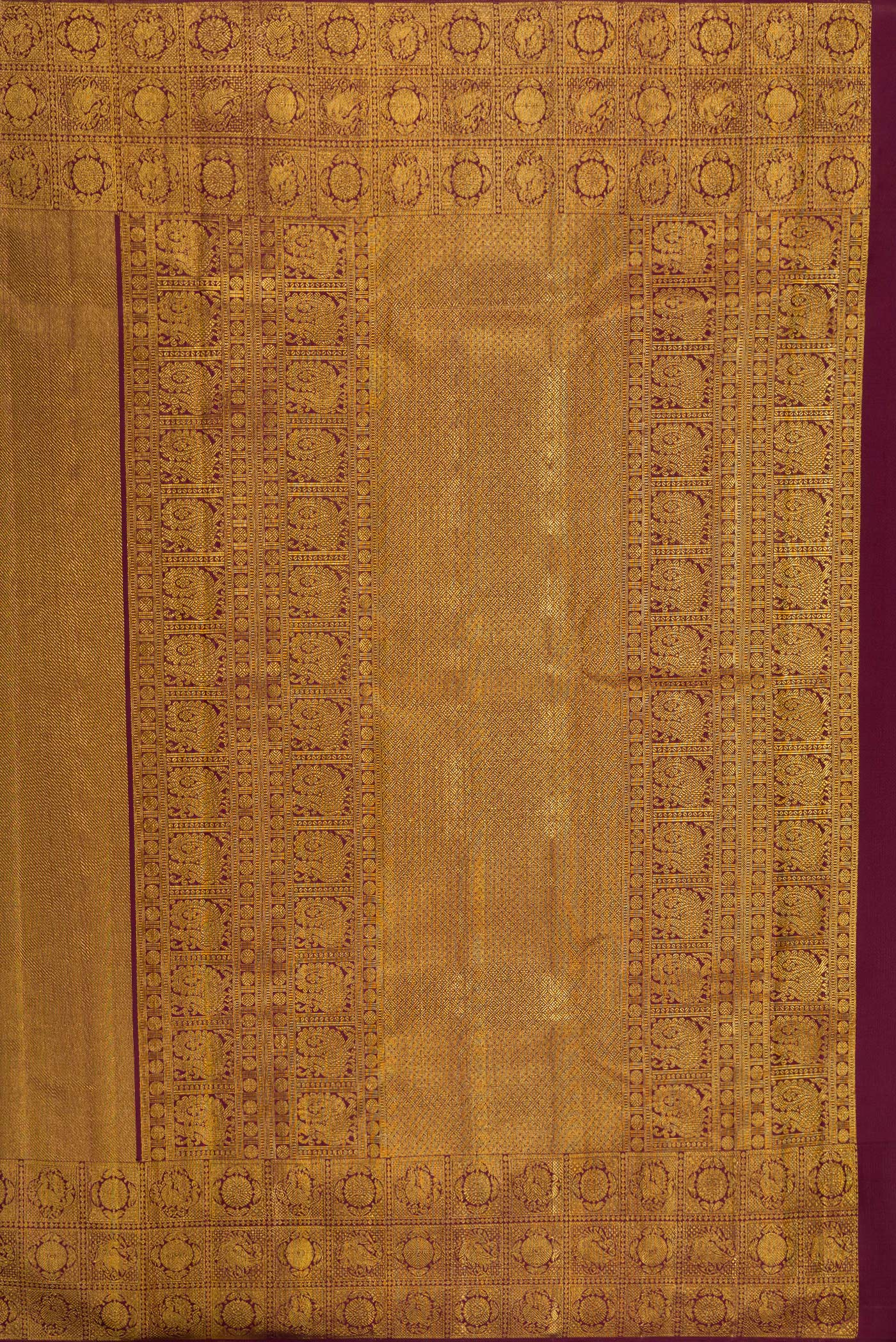 Close up image of the pallu of Coffee Brown Kanchipuram Silk Saree with Zari Brocade on the body and Fancy Border. 