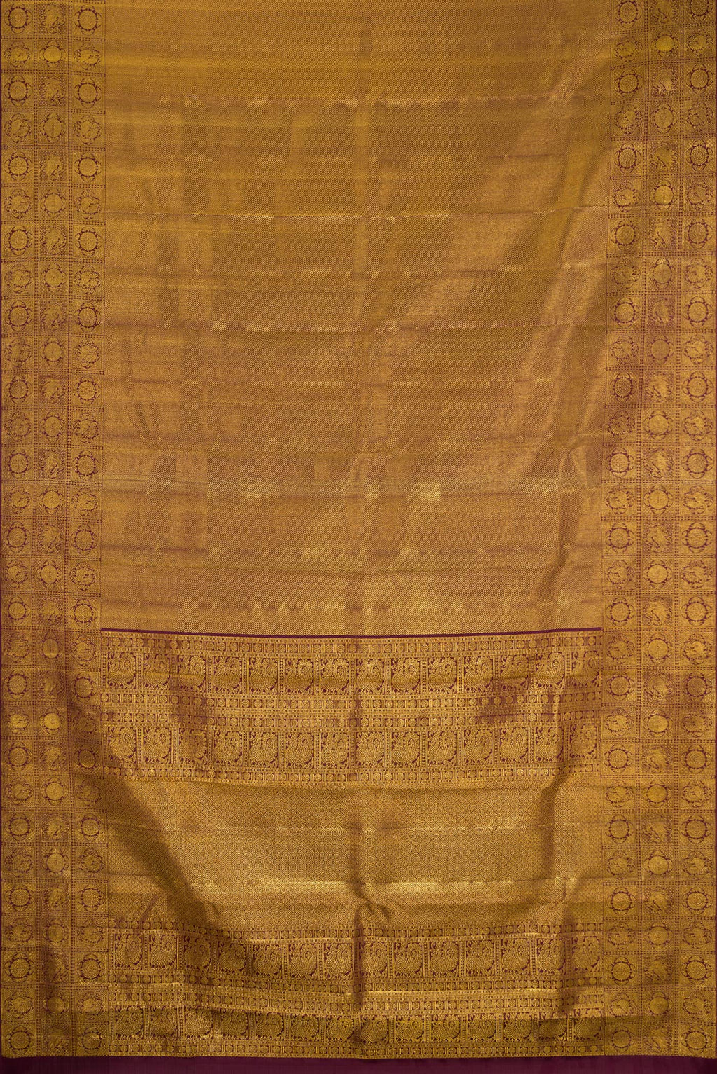 Flat view of Coffee Brown Kanchipuram Silk Saree with Zari Brocade on the body and Fancy Border. 