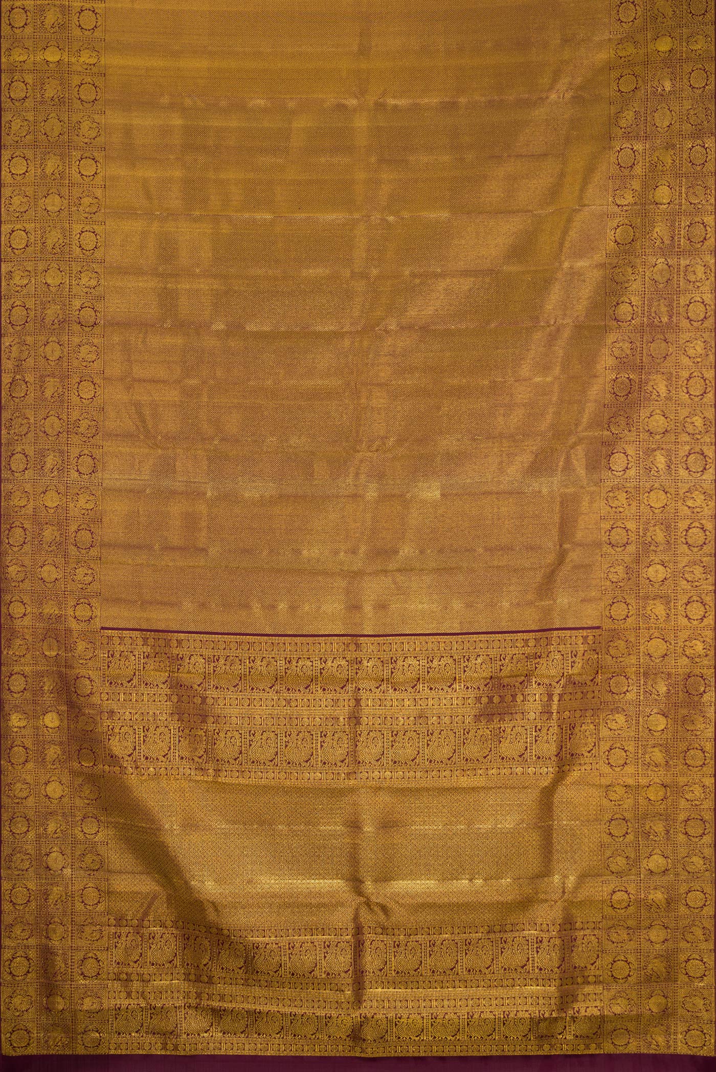 Flat view of Coffee Brown Kanchipuram Silk Saree with Zari Brocade on the body and Fancy Border. 