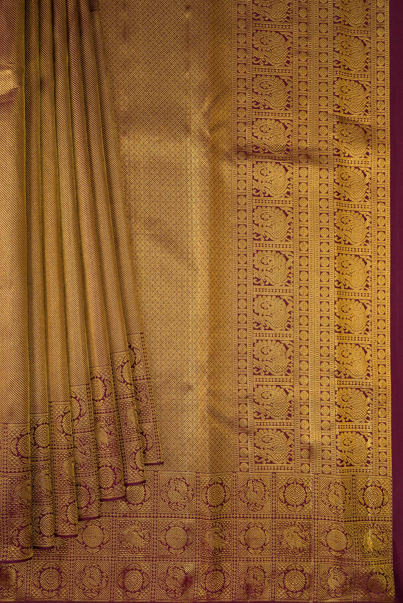 Pleats and pallu of Coffee Brown Kanchipuram Silk Saree with Zari Brocade on the body and Fancy Border. 