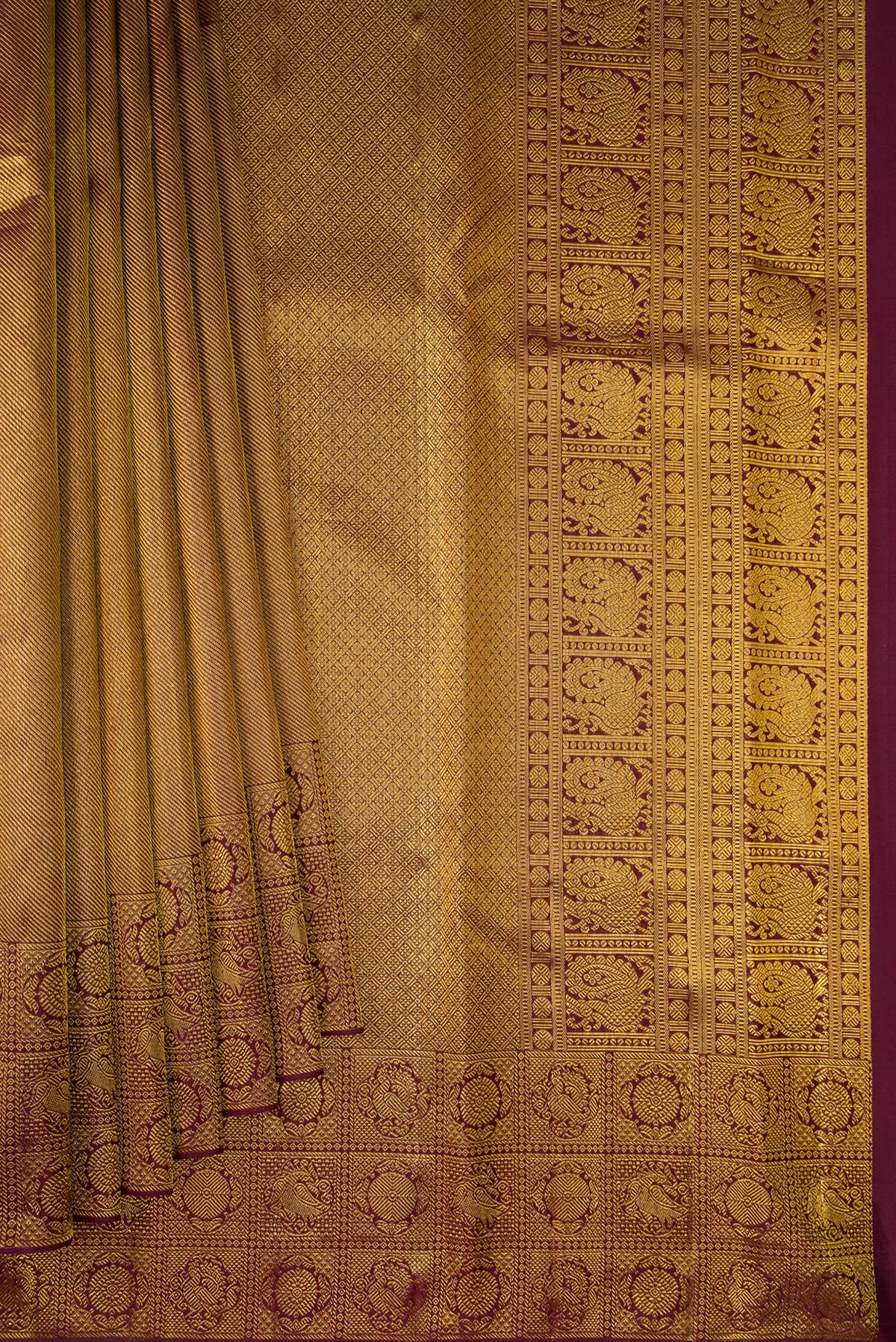 Pleats and pallu of Coffee Brown Kanchipuram Silk Saree with Zari Brocade on the body and Fancy Border. 
